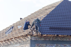 a contractor working on a roofing project