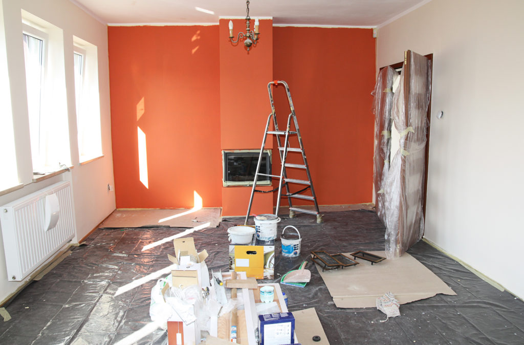 flat renovation, painting the  wall and fireplace