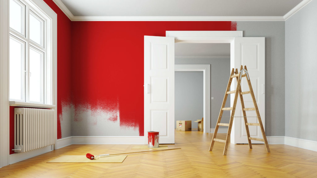 simple home renovation in the form of a room being painted red 